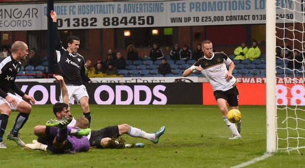 Adam Rooney prods the ball into the empty net to double his side's lead