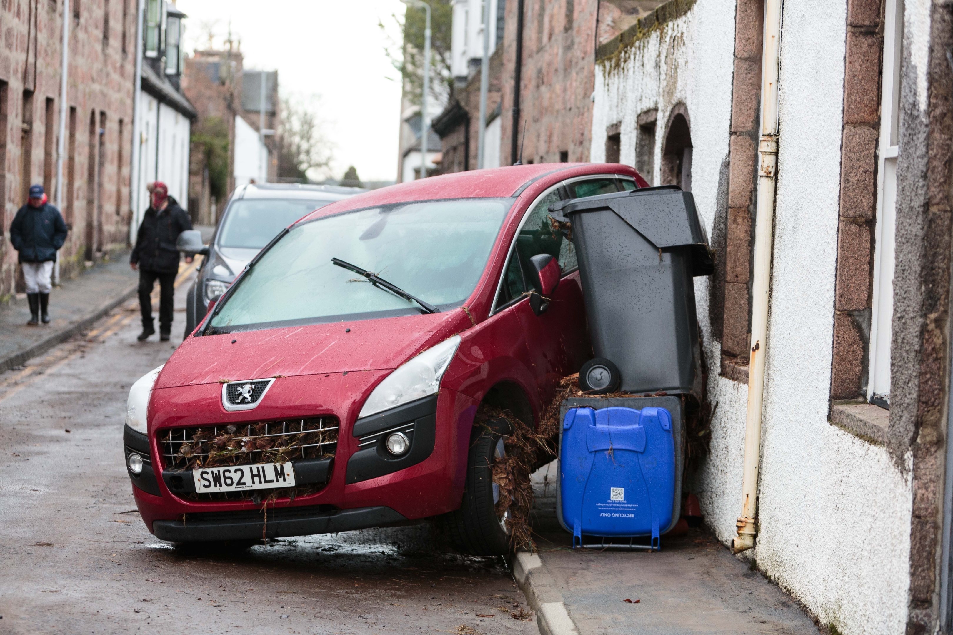 Cars and bins swept away 