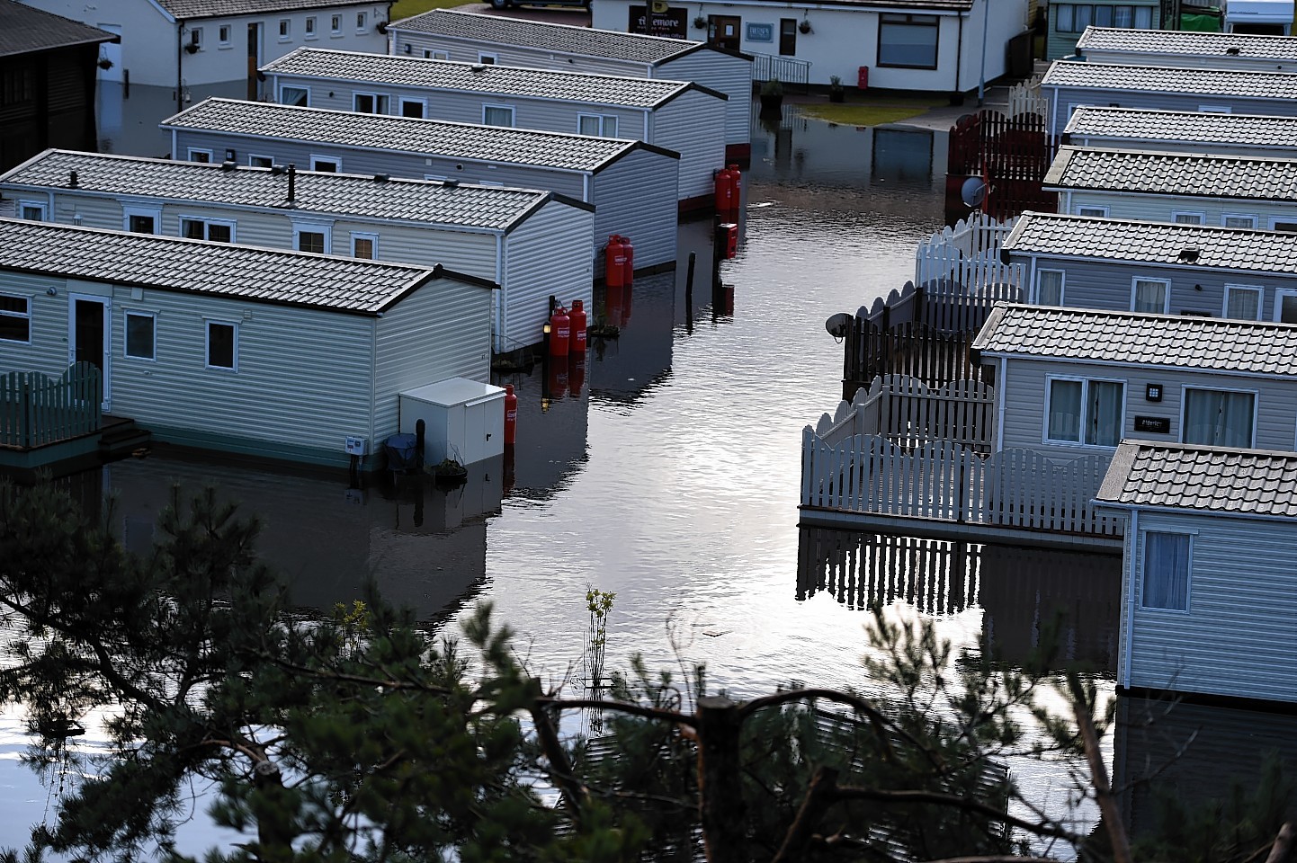 Flooding at the caravan site in Aviemore.Picture by Gordon Lennox 06/12/2015