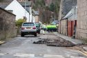 The aftermath of Storm Frank is revealed as residents of Ballater begin the clear-up on New Years Eve.
Photo: Ross Johnston/Newsline Media)