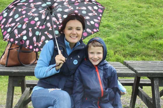 A volunteer befriender and a youngster enjoying some time together.