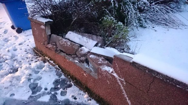 The damage to the wall outside Sam Lumsden's home in Inverness