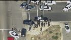 First responders gather outside a Southern California social services center in San Bernardino