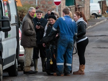 Prince Charles speaks to residents in Ballater in the wake of Storm Frank. Photo: Ross Johnston/Newsline Media