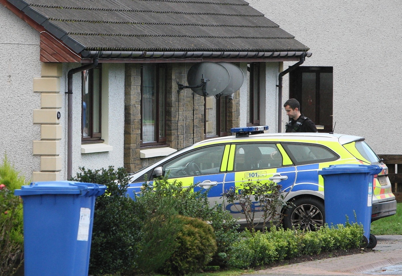 Police on the scene at Coiltie Crescent. Picture: Andrew Smith