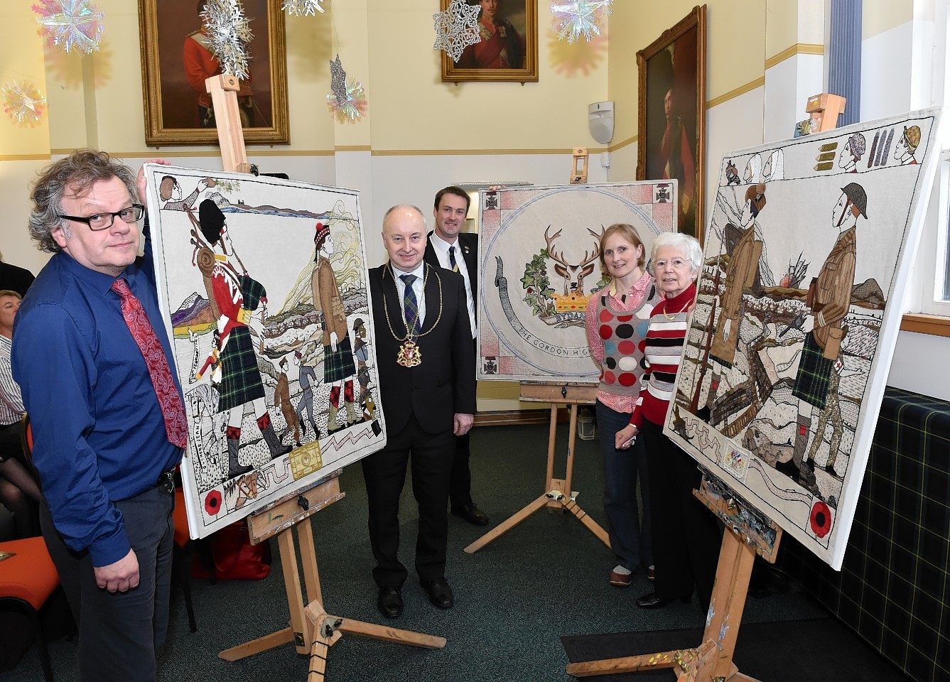 Artist Andrew Crummy, Lord Provost Geoge Adam, Bryan Snelling, Chief Executive Gordon Highlanders, stitchers Anne Murray (from Huntly), Audrey Anderson (Aberdeen) and stitch co-ordinator Dorie Wilkie. Picture by Colin Rennie