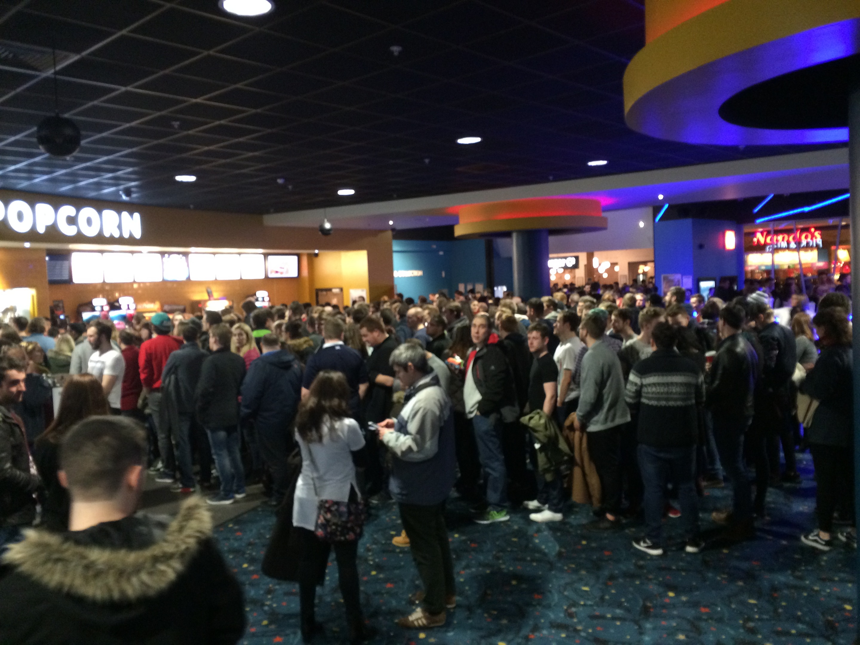 Fans queue out the door before the midnight screenings of Star Wars: The Force Awakens in Aberdeen's Union Square