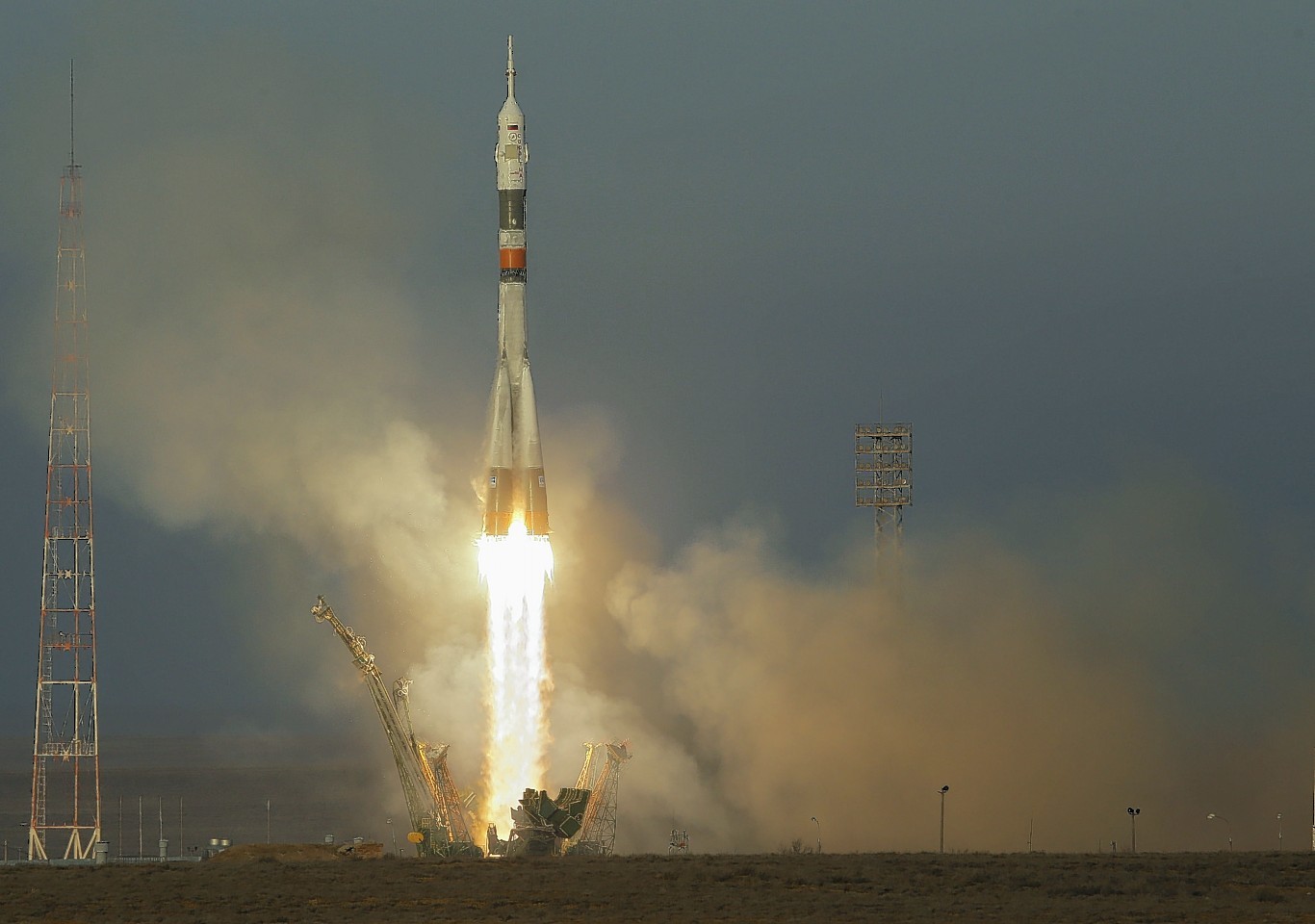 The Soyuz-FG rocket booster with Soyuz TMA-19M space ship carrying the crew to the International Space Station