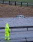 M74 northbound at J13 Abington is closed due to flooding caused by Storm Frank. Vehicles are seen floating in water and lorries pass with care. Dec 30 2015