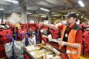 Christmas at Royal Mail in Altens, Aberdeen. Matthew Fleming sorts parcels. Picture by Colin Rennie