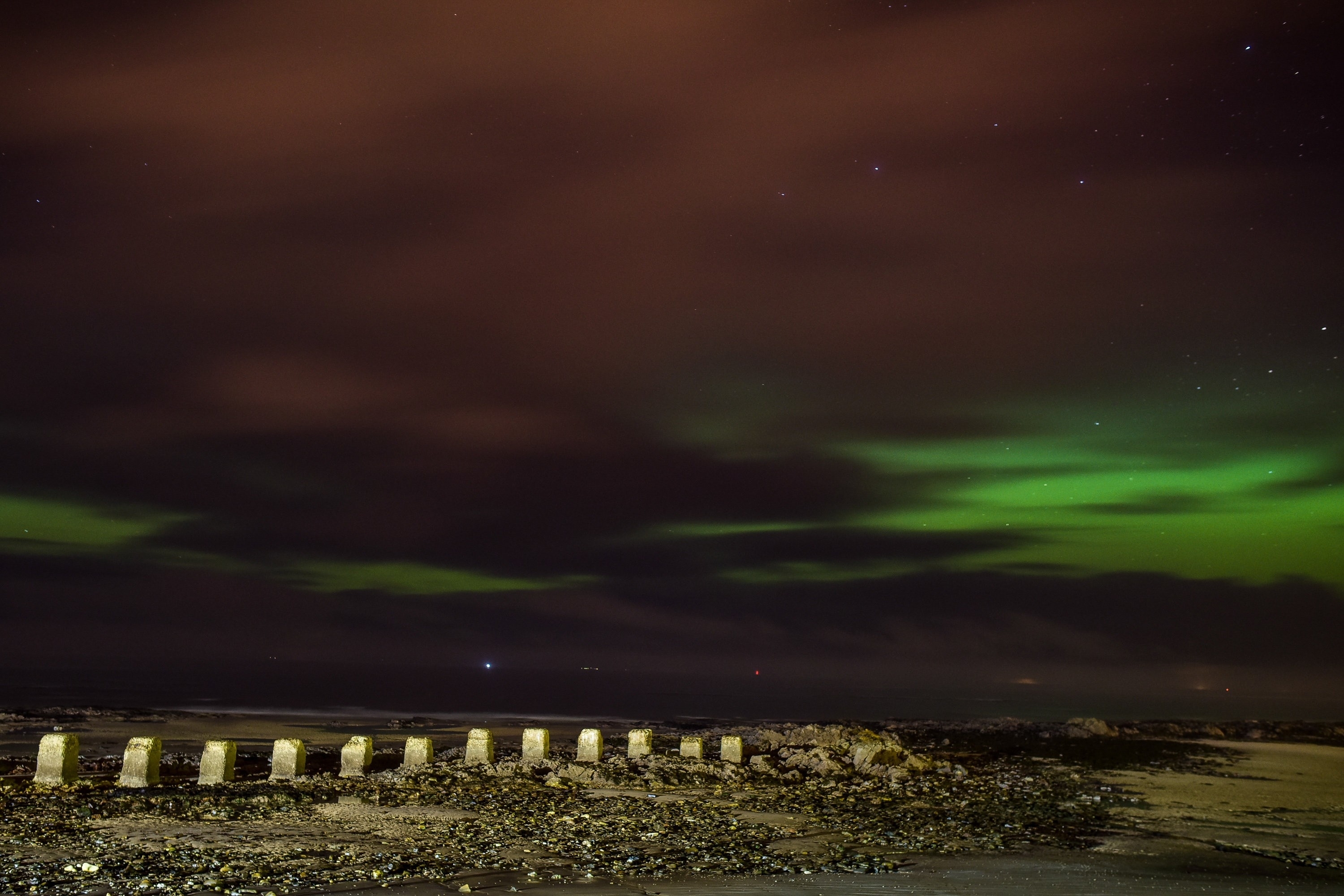 The Northern Lights, Aurora Borealis, are seen over the West Beach in Lossiemouth, Moray on December 14 2015.