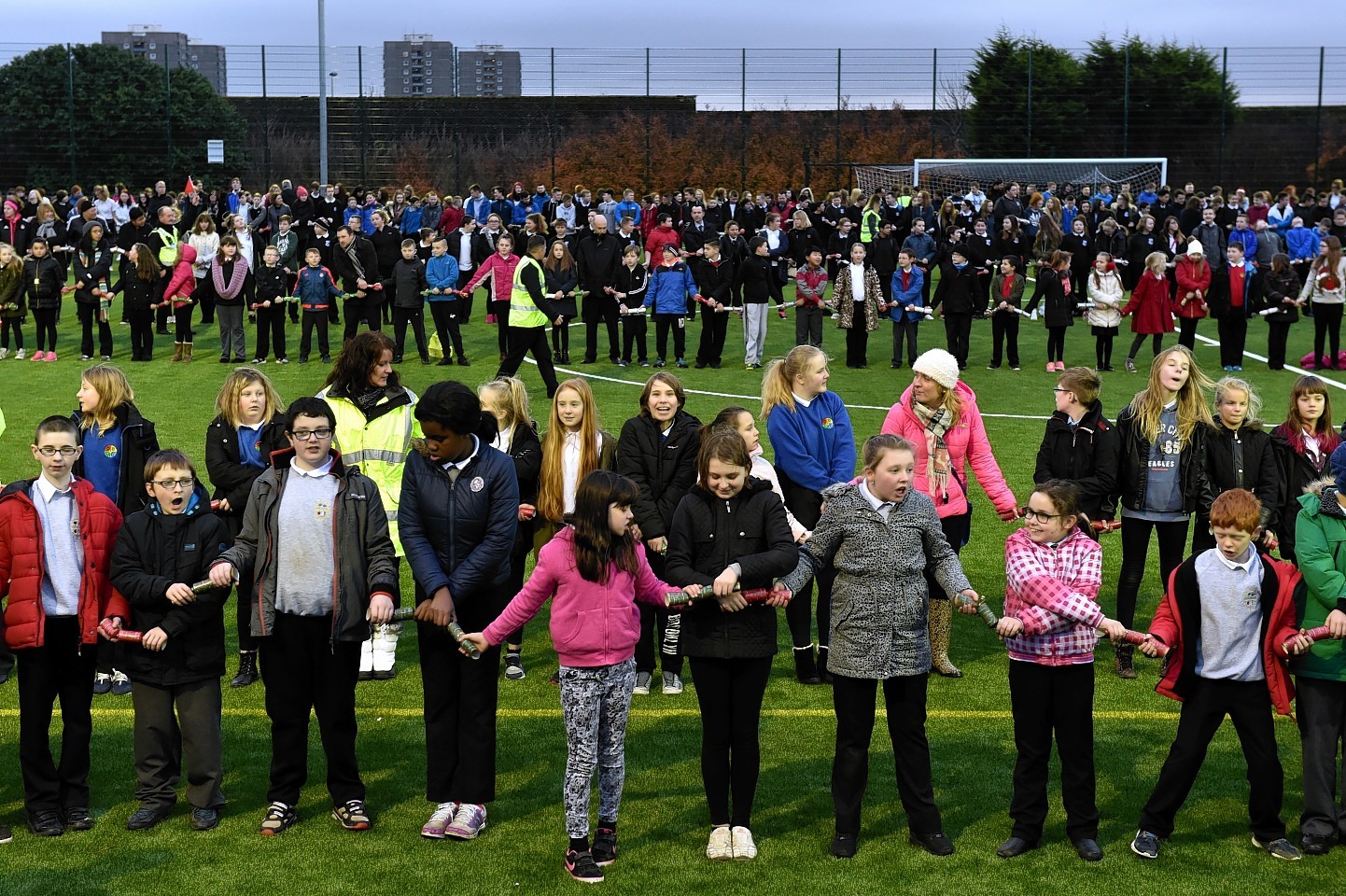 Northfield Academy pupils try to break world record for longest chain of Christmas crackers pulled at the same time