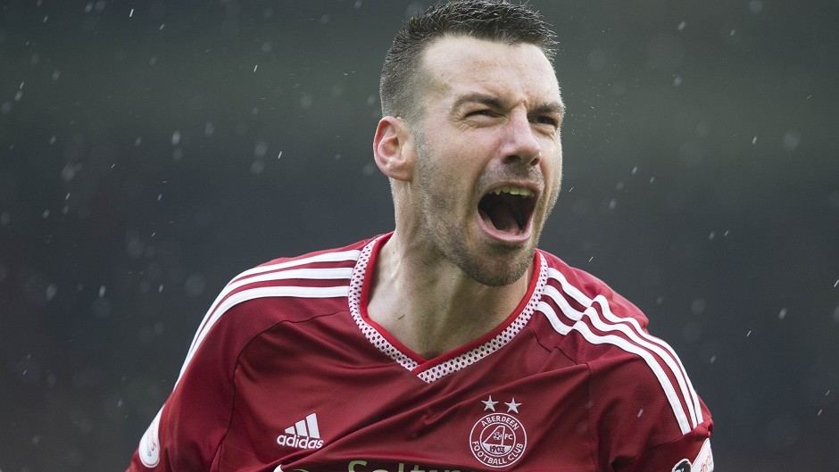 Aberdeen's Paul Quinn is wanted by Ross County