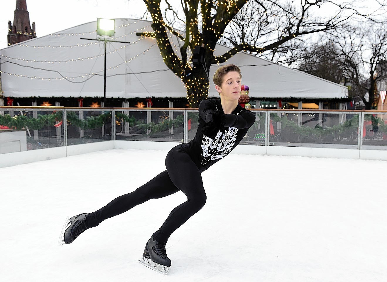 Aberdonian and Robert Gordon's College pupil Ruaridh Fisher on the ice rink at Aberdeen's Christmas village.
