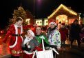 Chloe, Sam and Nicola Wilson with Millie Buchan at the Christmas light switch on at Trump International Golf Course