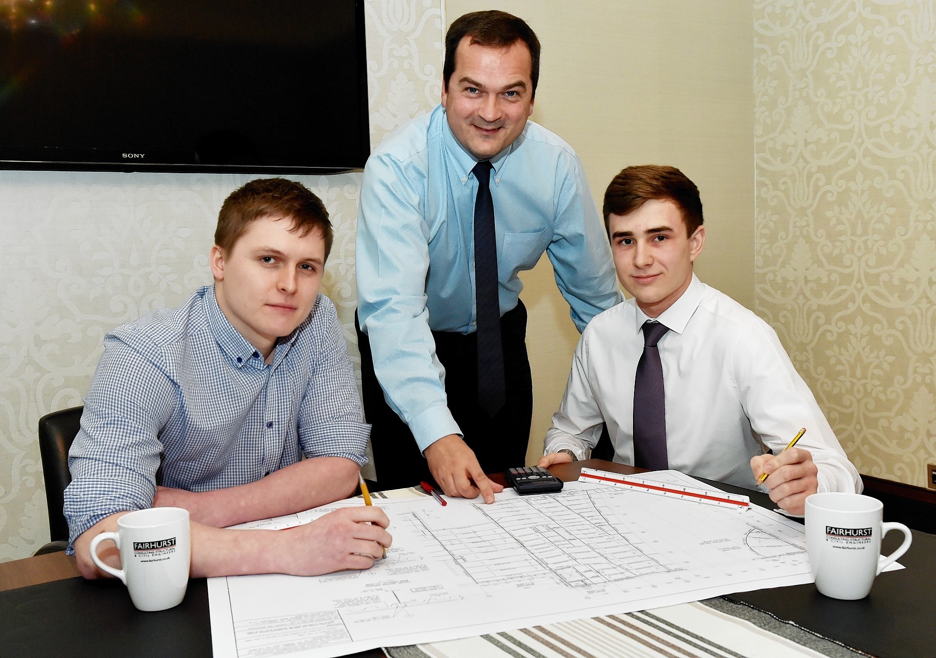 Fairhurst Partner Alastair Scott-Kiddie (centre) with Craig Donaldson (left) and Dale Chapman.