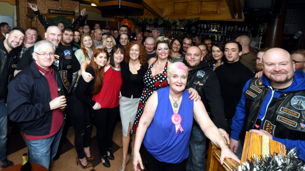 Val Morrison, centre, with the regulars of the Crown and Anchor on what they thought would be the bar's final night