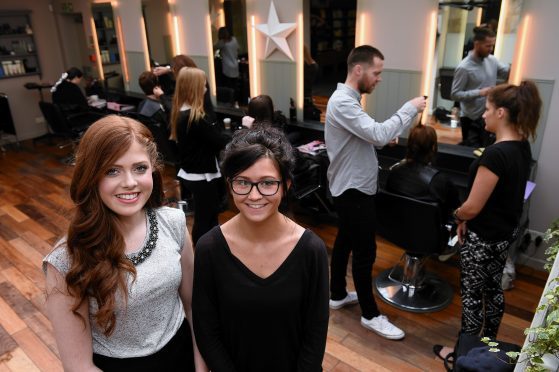 Trainee hairdresser Nicole Simpson, left, and Kara Welsh.