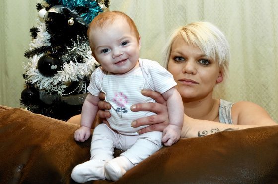 Jenna Wilson with her baby Ava at home in Cairnbuig