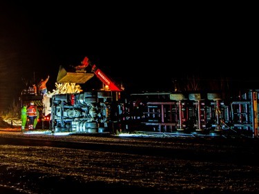 Steve MacDougall, Courier, A9 Dual Carriageway one Mile North of Pitlochry. Pictured, overturned lorry on A9 with emergency services at the scene.