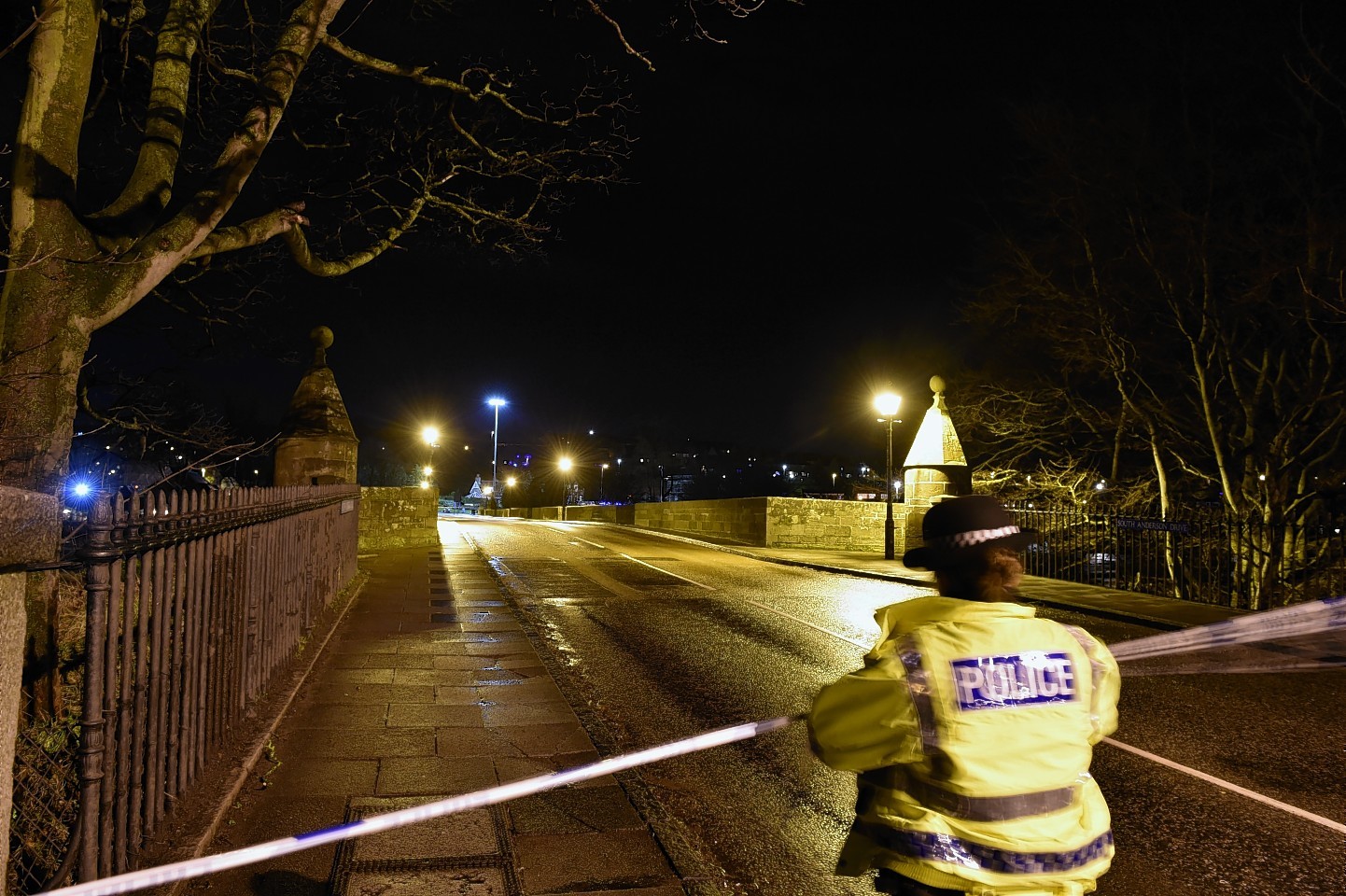 Police seal off the  Bridge of Dee in Aberdeen during the worst of the flooding (Picture: Colin Rennie)