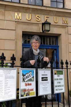 Janet Trythall, vice-president of Moray Society, at the gates of Elgin Museum