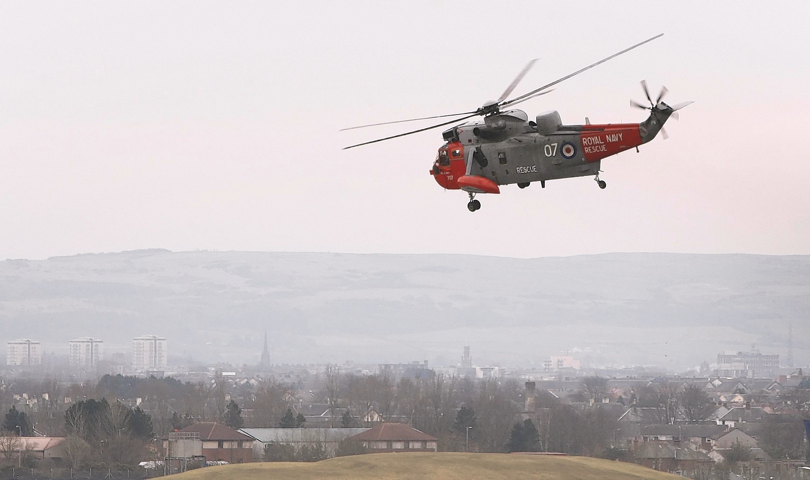 A Sea King helicopter takes off from HMS Gannet