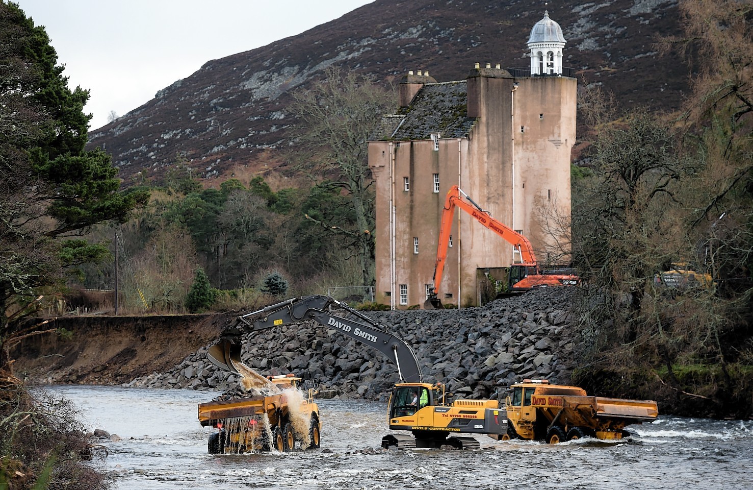 Work to save Abergeldie Castle after it was almost washed into the River Dee. Pictures by Kenny Elrick and Kami Thomson 