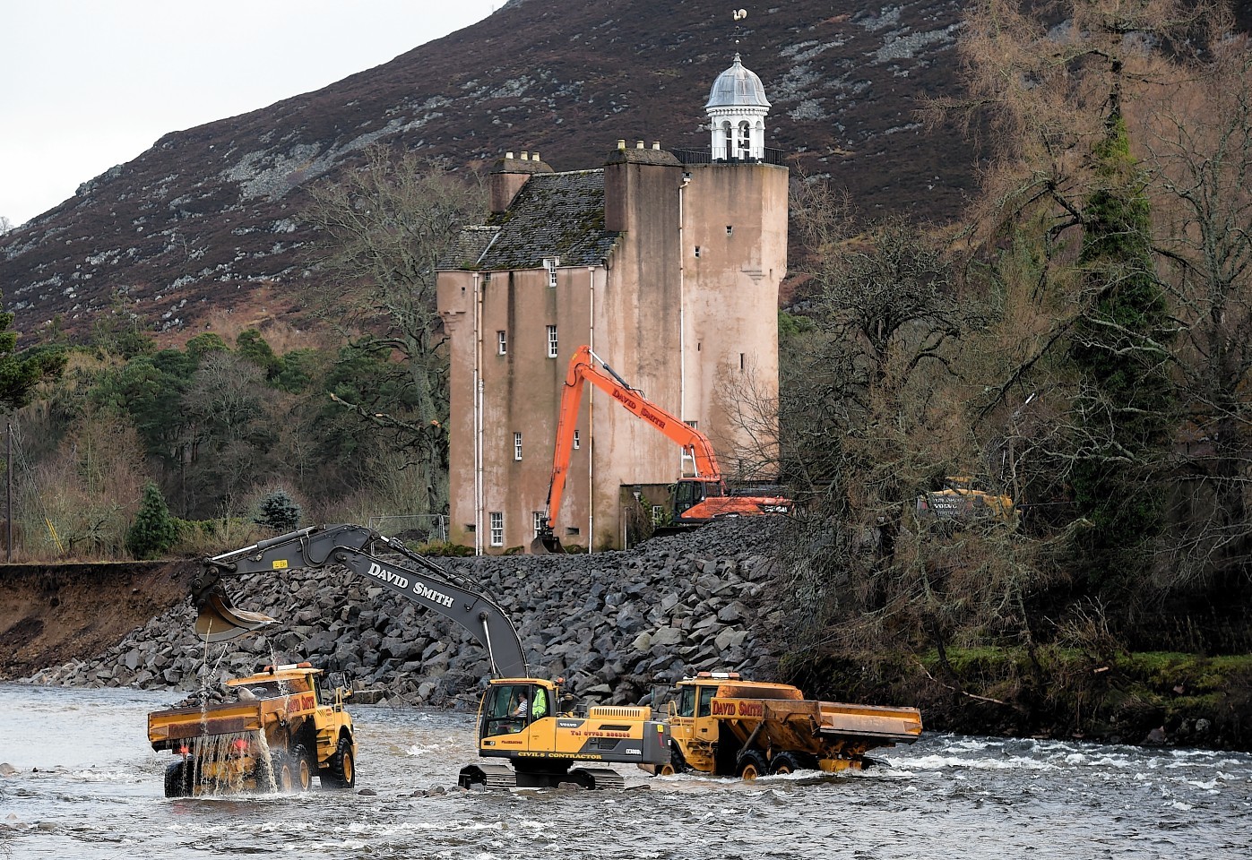 Work to save Abergeldie Castle after it was almost washed into the River Dee. Pictures by Kenny Elrick and Kami Thomson