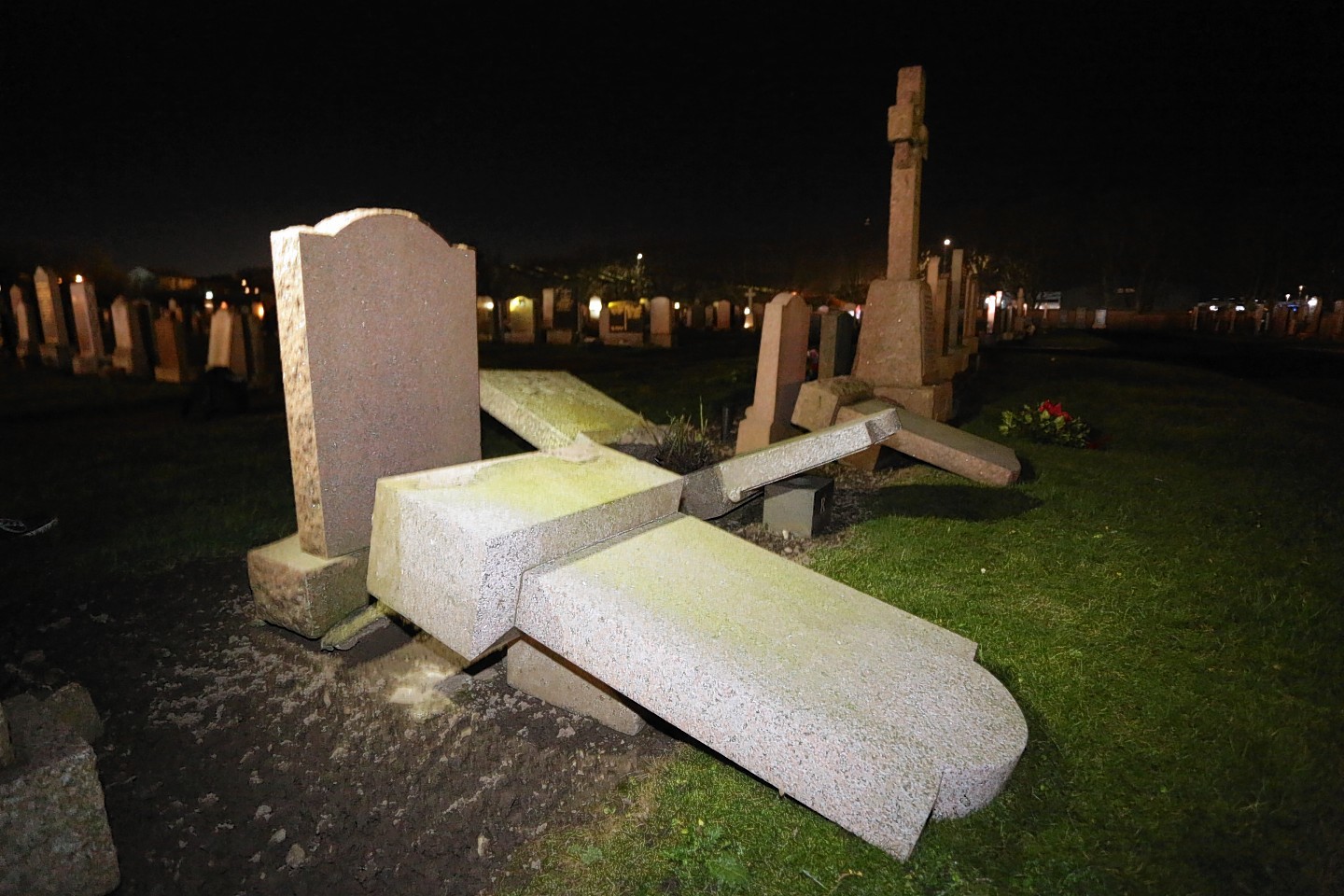 The damaged graves at Balmoor Cemetery, Peterhead.