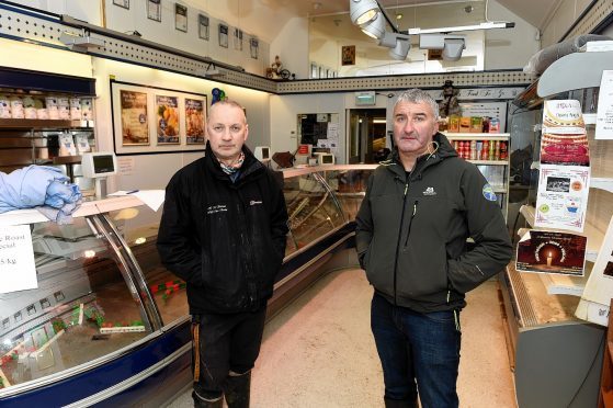 HM Sheridan butchers Barry Florence and John Sinclair whose business has been left devastated after the River Dee burst it's banks at Ballater. Picture by Kevin Emslie