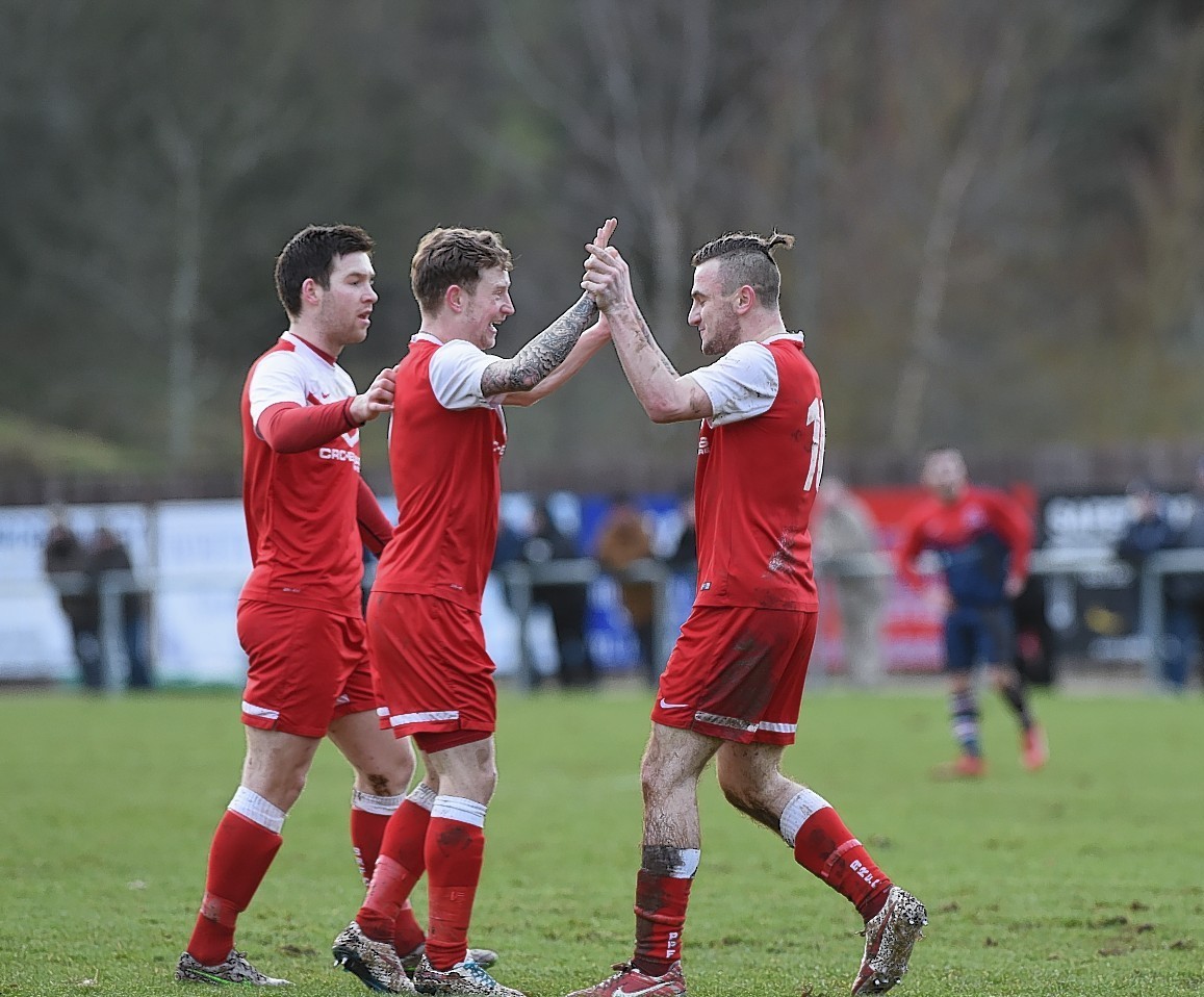Brora celebrate netting against Turriff this afternoon