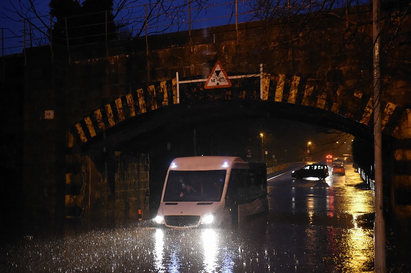 A bus  trapped by the floods on Stoneywood Road in Dyce