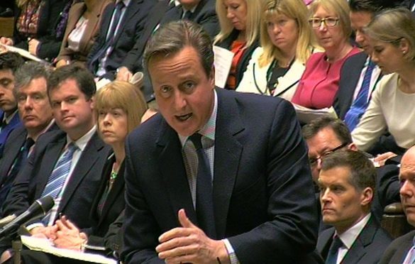 Prime Minister David Cameron speaks during Prime Minister's Questions in the House of Commons, London.