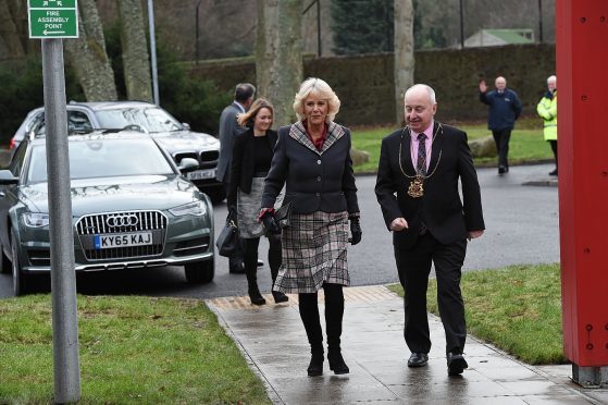 The Duchess of Rothesay arrives with the Lord Provost George Adam at Aberdeen University.