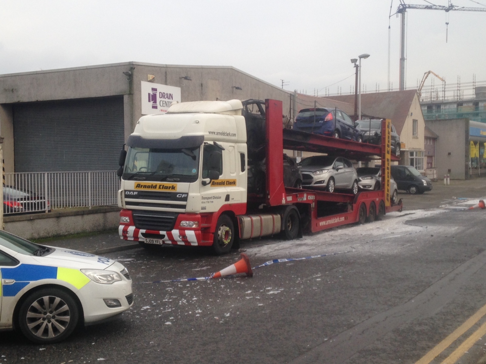 The car transporter and vehicles it was carrying were left badly damaged