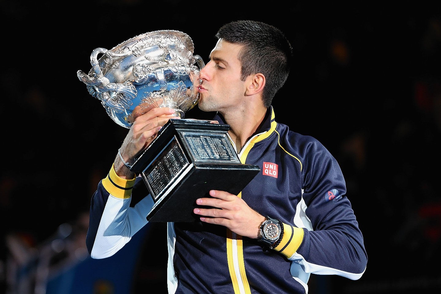 Djokovic kisses the Australian Open trophy following his victory in 2013