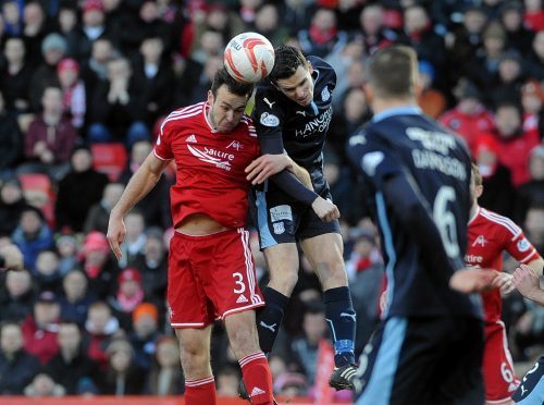 The Dons face Dundee at Dens Park on Sunday.