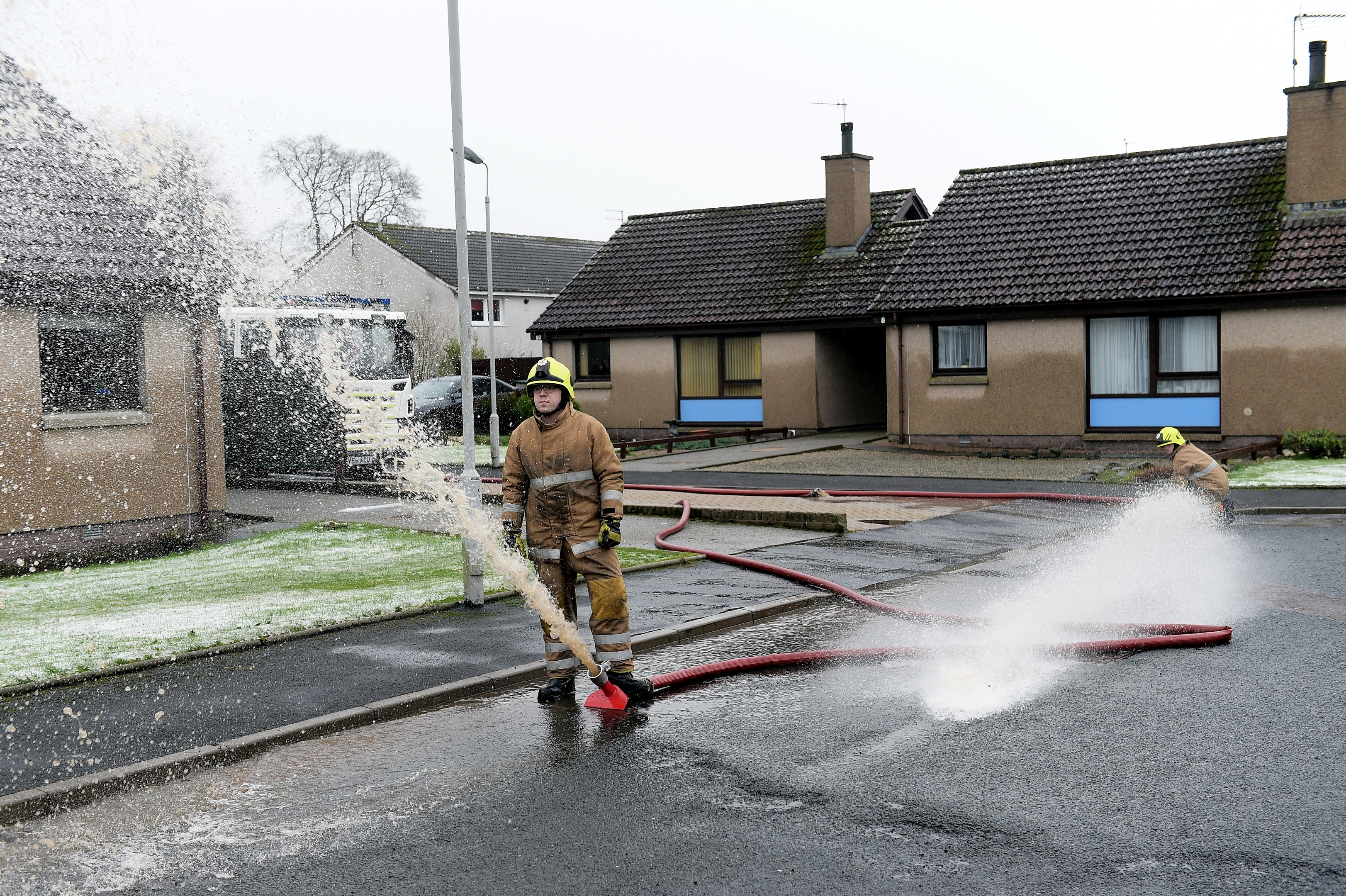 The River Ythan has burst it's banks at Ellon. Scottish Fire and Rescue pump water out of an area with an electric substation at Modley Close, which resulted in no power in the area since the early hours of the morning. Pictures by Kami Thomson 