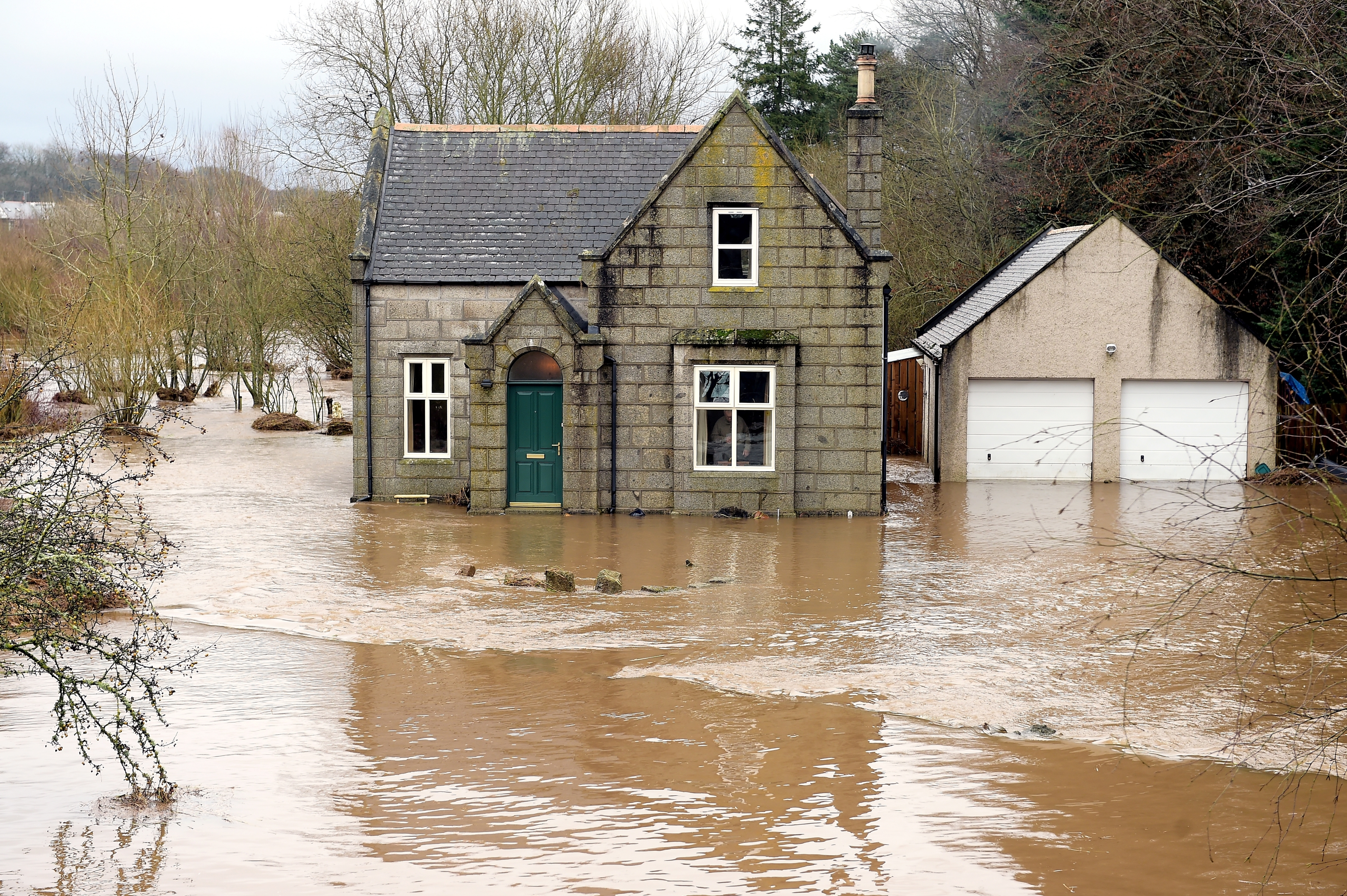 The River Ythan has burst it's banks at Ellon. The home of George Thomson on the banks of the Ythan near the old bridge which was flooded last night. 