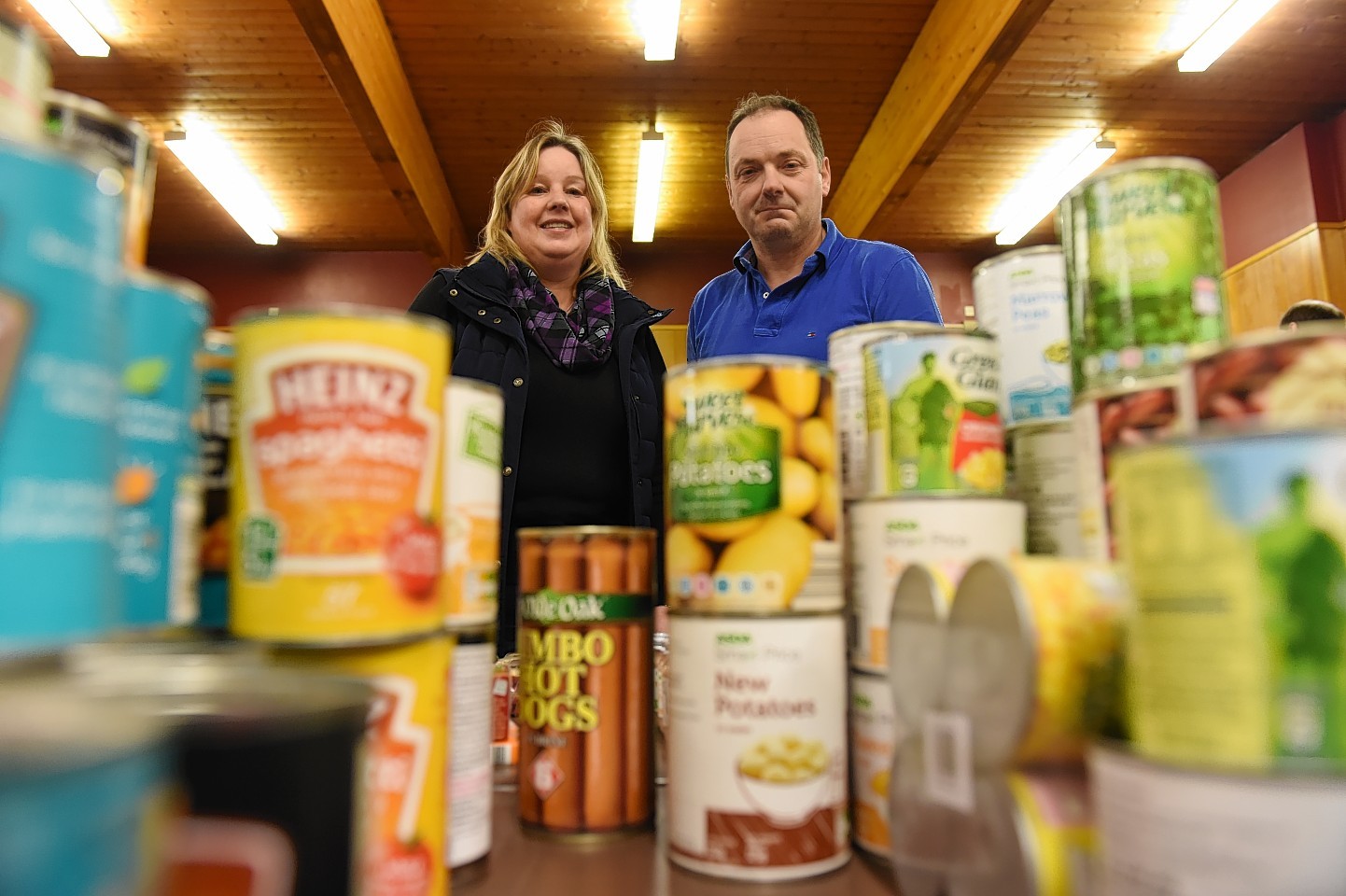 Fiona Conner and co-organiser George Petrie of the Flood Support group, have been collecting donations to give to flood victims at the British Legion, Inverurie. Picture by Kenny Elrick 