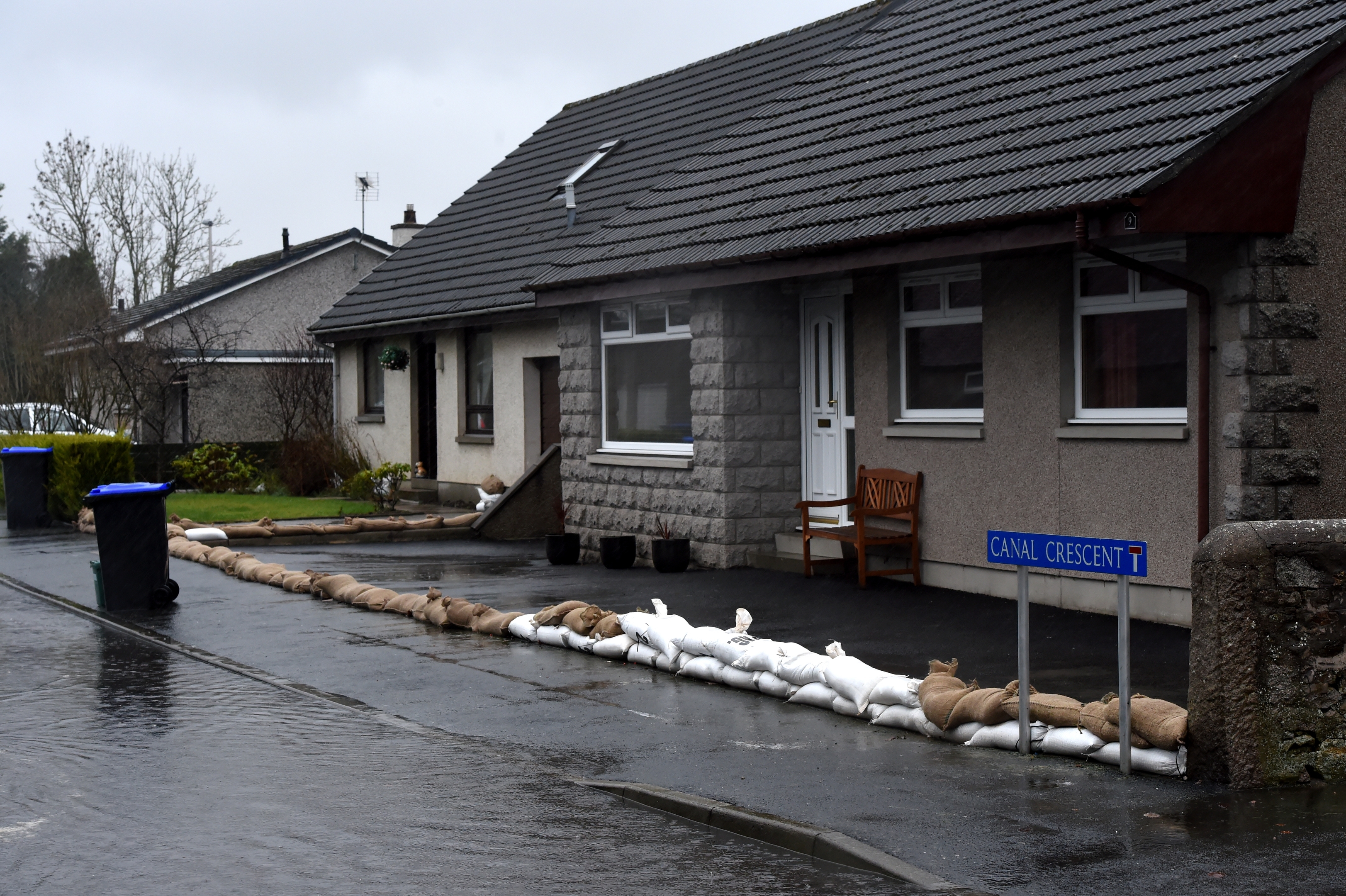 Residents with sand bags ready for flooding on Canal Crescent in Port Elphinstone, Inverurie. 