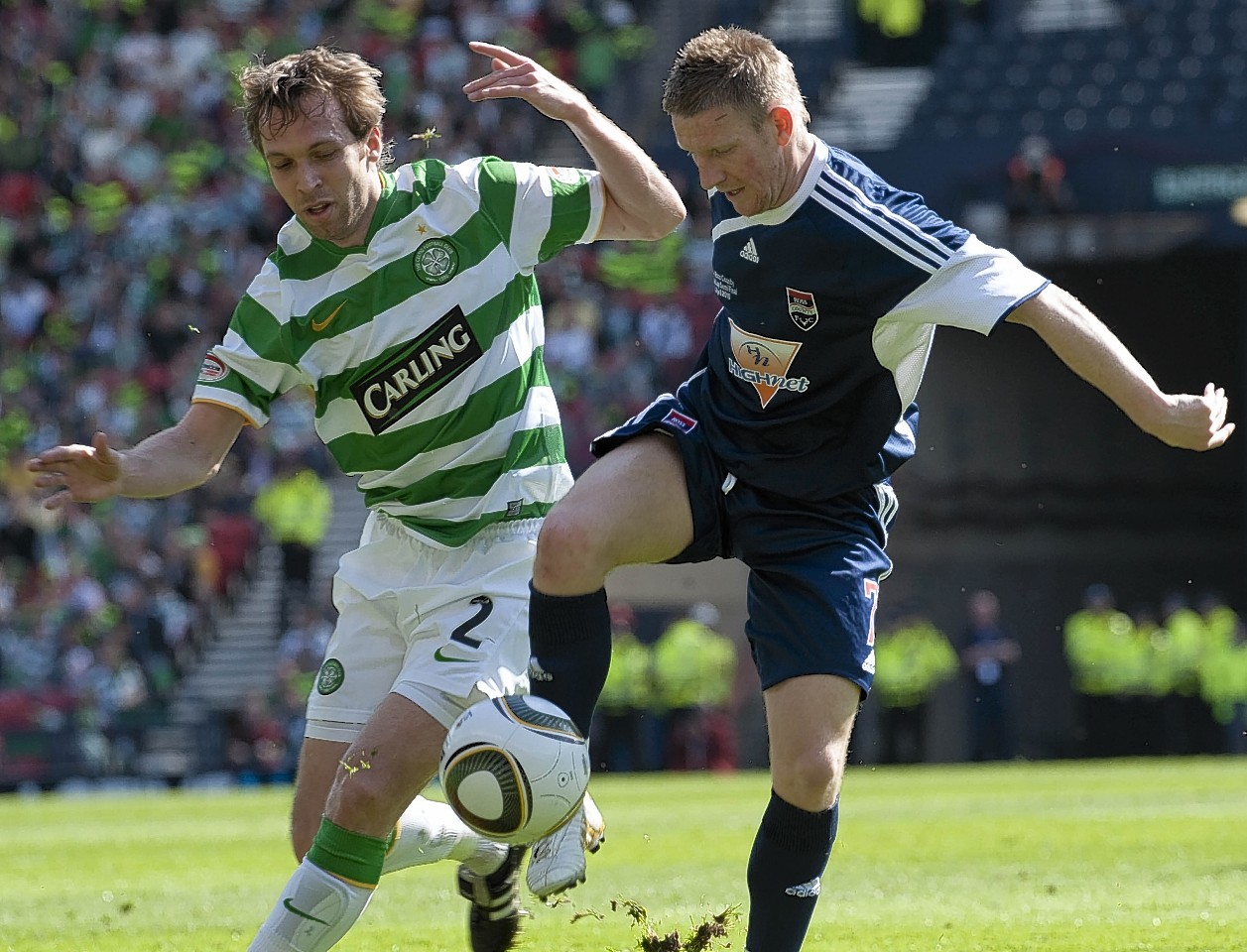 Michael Gardyne, in action against Celtic defender Andreas Hinkel during the 2010 clash