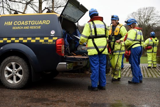 Search for missing Aberlour woman. Coastguards gather at Aberlour before searching along the River Spey.
PictureS by Gordon Lennox