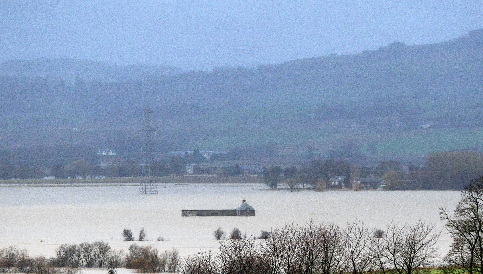 The River Isla has burst its banks flooding many surrounding roads and bridges