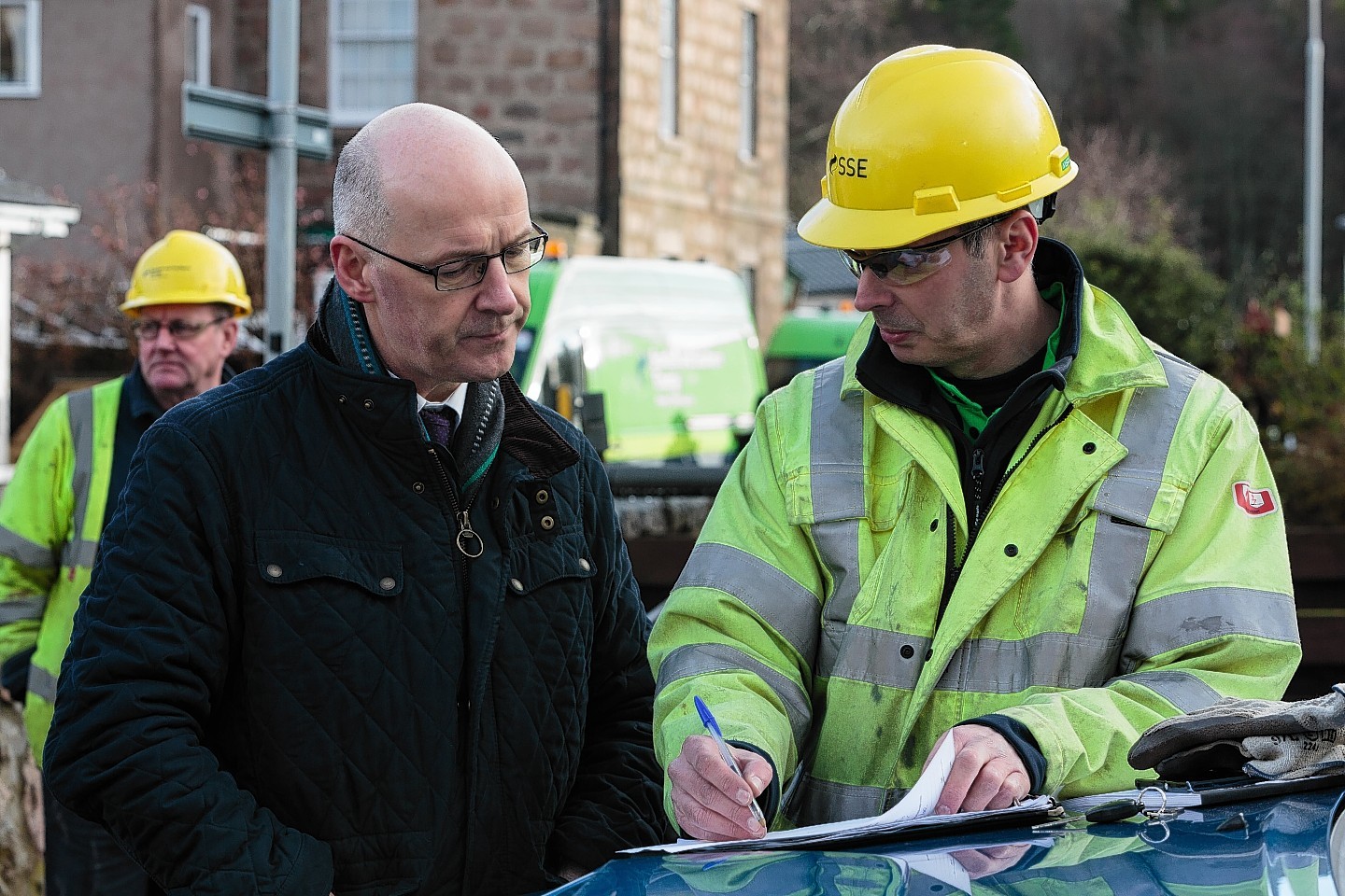 Pictured: Deputy First Minister John Swinney speaks to SSE staff