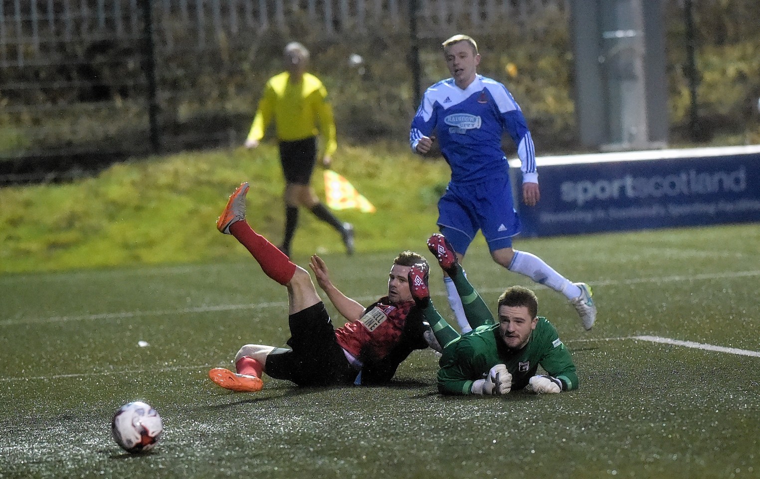 Daryl Nicol scores Cove's second past keeper Scott Mathieson and defender Marc Young.  Picture by Kami Thomson  
