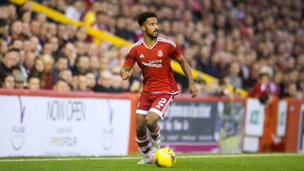 Shay Logan in action for Aberdeen.