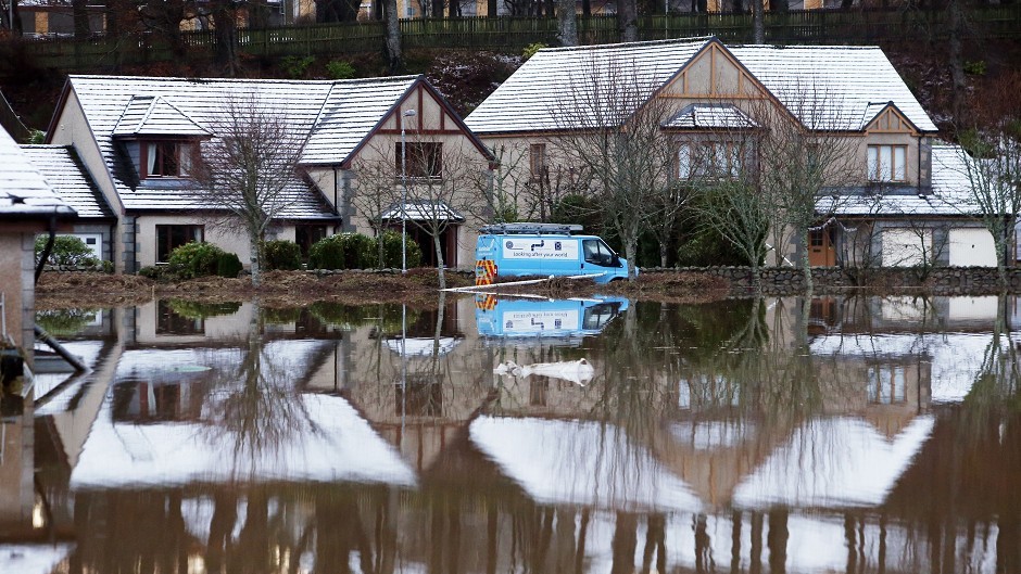 Flooded houses at Port Elphinstone, near Aberdeen, after the River Don burst its banks