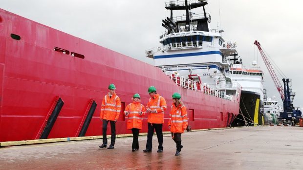 David Cameron receives a tour of Aberdeen Harbour in Scotland